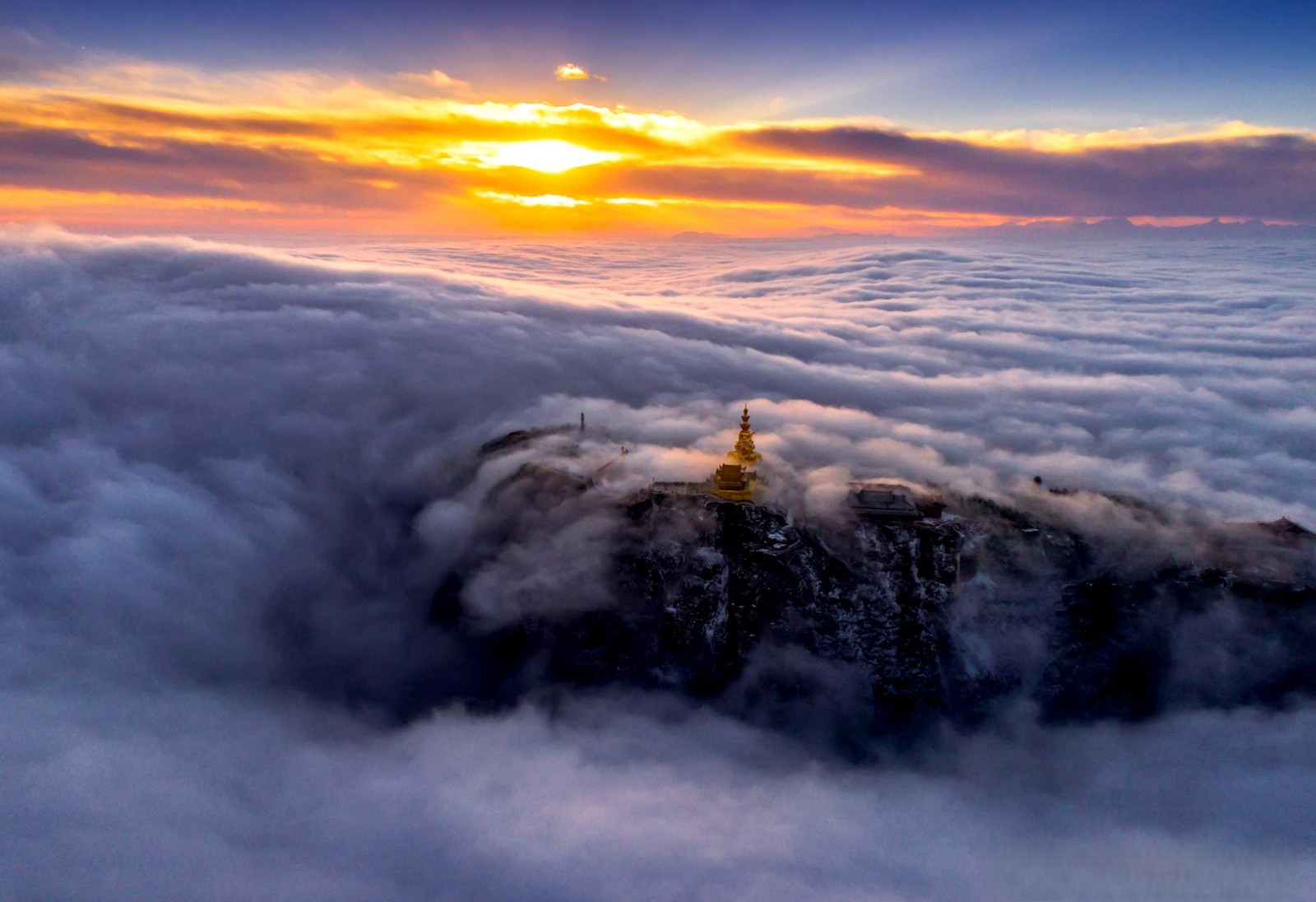 Golden Sunrise at Mount Emei Summit
